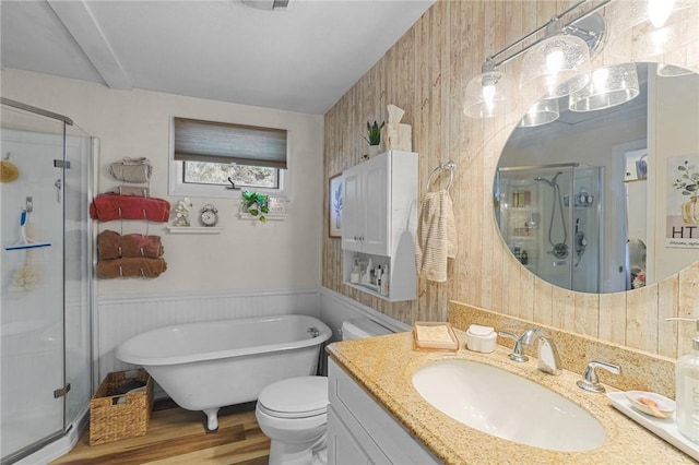 52 Eddy St, North Providence, RI 02911 - full bath featuring a shower stall, vanity, a soaking tub, wood finished floors, and wainscoting