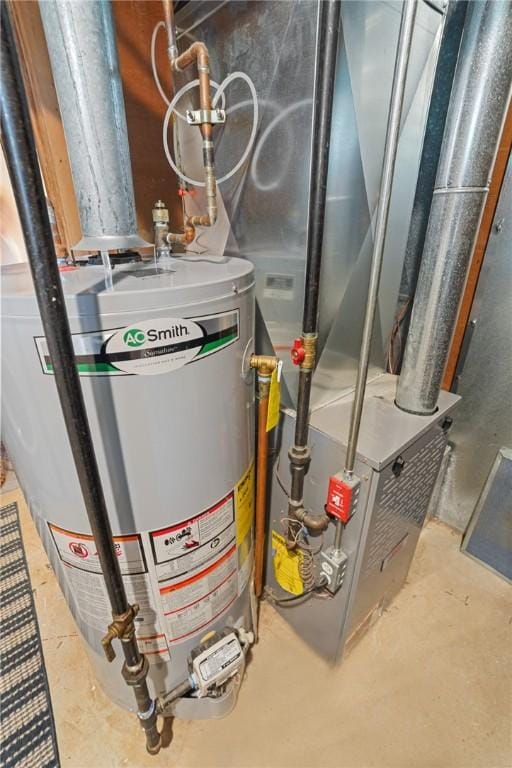 52 Eddy St, North Providence, RI 02911 - utility room featuring water heater