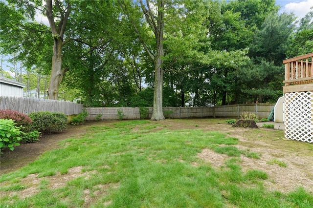 52 Eddy St, North Providence, RI 02911 - fenced backyard with view of wooded area