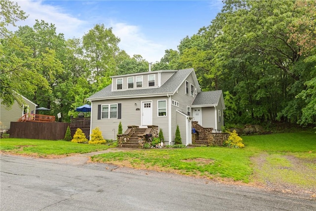 27 Aberdeen St, West Warwick, RI 02893 - view of front of house with a front yard and roof with shingles