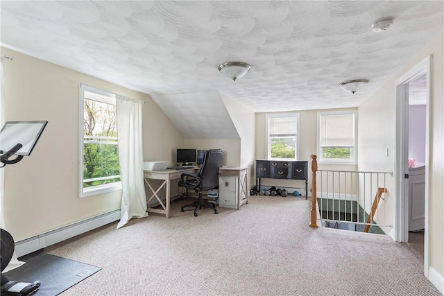 27 Aberdeen St, West Warwick, RI 02893 - home office with carpet floors, healthy amount of natural light, baseboard heating, lofted ceiling, and a textured ceiling