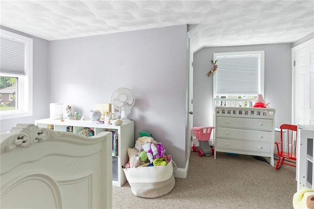 27 Aberdeen St, West Warwick, RI 02893 - bedroom with carpet floors, a textured ceiling, and baseboards