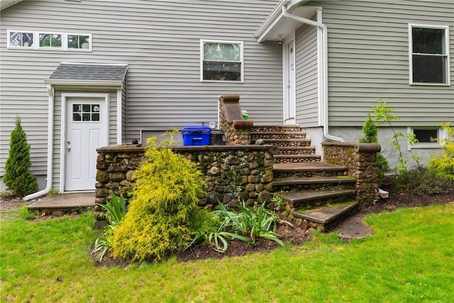 27 Aberdeen St, West Warwick, RI 02893 - rear view of house featuring a yard