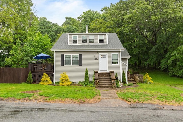 27 Aberdeen St, West Warwick, RI 02893 - bungalow with a shingled roof and a deck