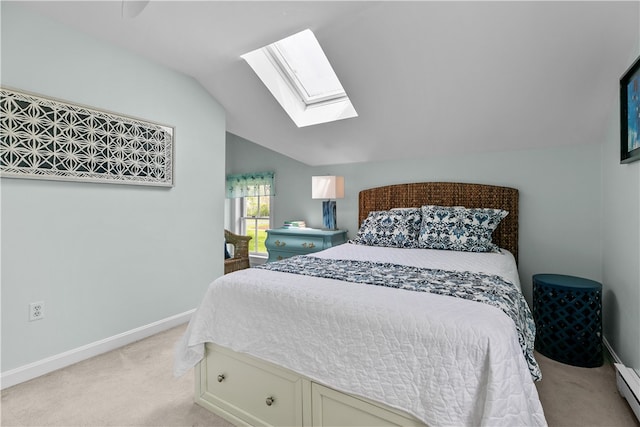 97 Narragansett Ave Unit C4, Newport, RI 02840 - bedroom with light colored carpet, lofted ceiling, a skylight, baseboards, and a baseboard radiator