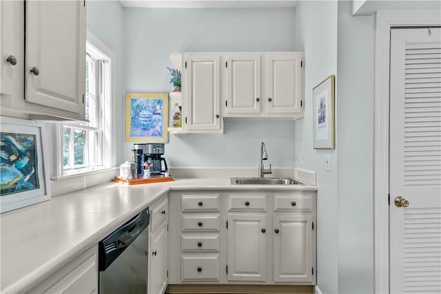 97 Narragansett Ave Unit C4, Newport, RI 02840 - kitchen featuring a sink, dishwasher, white cabinets, and light countertops