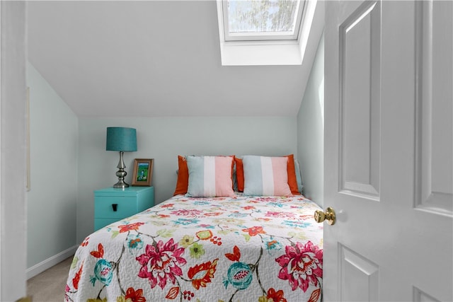 97 Narragansett Ave Unit C4, Newport, RI 02840 - bedroom featuring lofted ceiling, carpet floors, a skylight, and baseboards