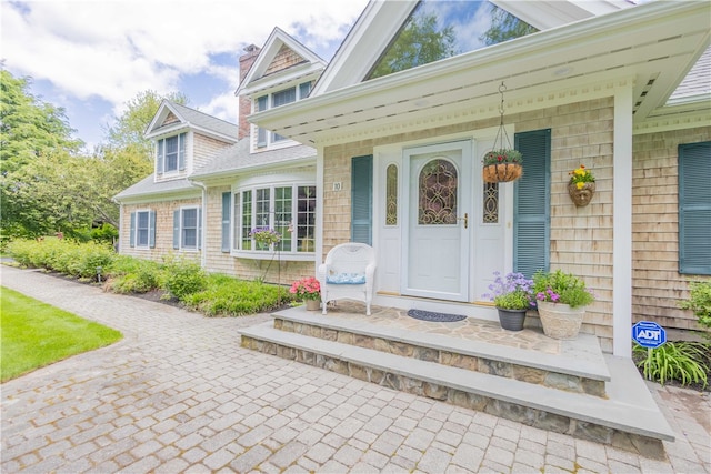 10 Bartlett Rd, Middletown, RI 02842 - doorway to property with a porch