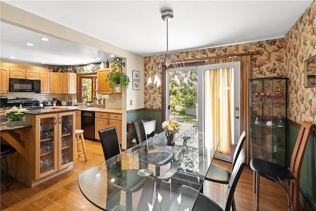 10 Bartlett Rd, Middletown, RI 02842 - dining area featuring wallpapered walls, light wood-type flooring, and recessed lighting