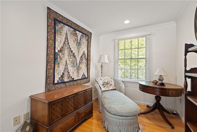 10 Bartlett Rd, Middletown, RI 02842 - sitting room with ornamental molding, light wood finished floors, baseboards, and recessed lighting