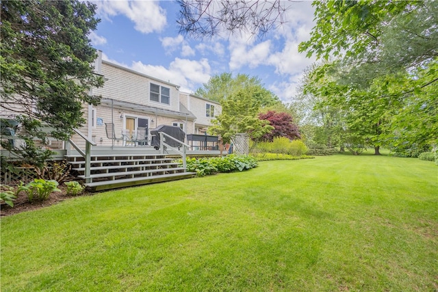 10 Bartlett Rd, Middletown, RI 02842 - view of grassy yard with a wooden deck