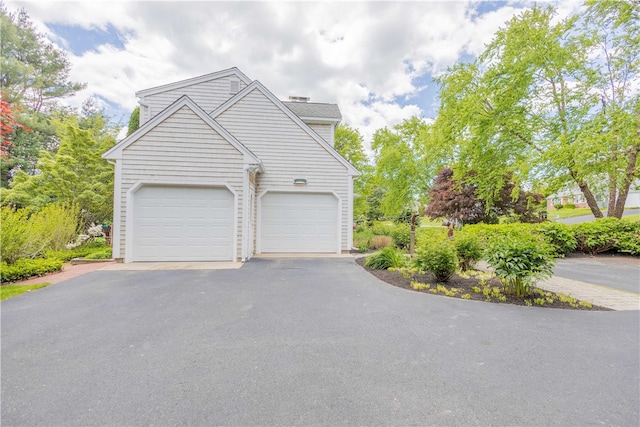 10 Bartlett Rd, Middletown, RI 02842 - view of side of property featuring driveway