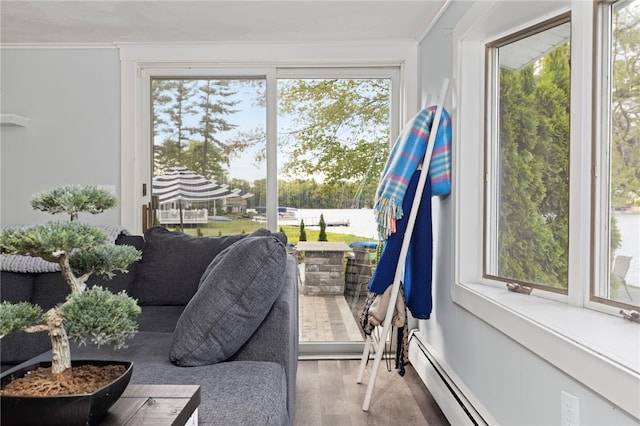 250 Shippee Plat Rd, Coventry, RI 02816 - sunroom with healthy amount of natural light and a baseboard heating unit