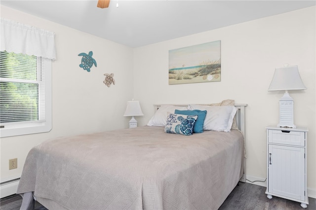 250 Shippee Plat Rd, Coventry, RI 02816 - bedroom featuring baseboard heating, dark wood-type flooring, and a ceiling fan