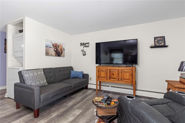 250 Shippee Plat Rd, Coventry, RI 02816 - living area featuring stacked washer / drying machine, wood finished floors, and baseboard heating