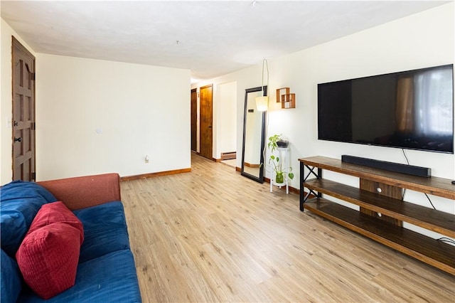 71 Julian St, Pawtucket, RI 02861 - living room with light wood-type flooring and baseboards