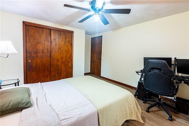 71 Julian St, Pawtucket, RI 02861 - bedroom with wood finished floors, a closet, ceiling fan, a desk, and baseboards