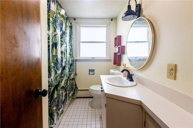 71 Julian St, Pawtucket, RI 02861 - full bath with a baseboard heating unit, tile patterned flooring, toilet, vanity, and a shower with curtain