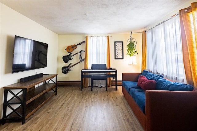 71 Julian St, Pawtucket, RI 02861 - living room with wood finished floors and baseboards
