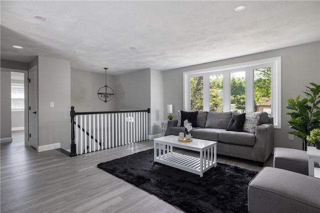 99 Scranton Ave, Warwick, RI 02888 - living room featuring healthy amount of natural light, baseboards, wood finished floors, and recessed lighting