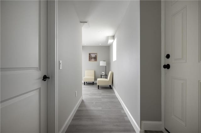 99 Scranton Ave, Warwick, RI 02888 - corridor featuring wood finished floors and baseboards