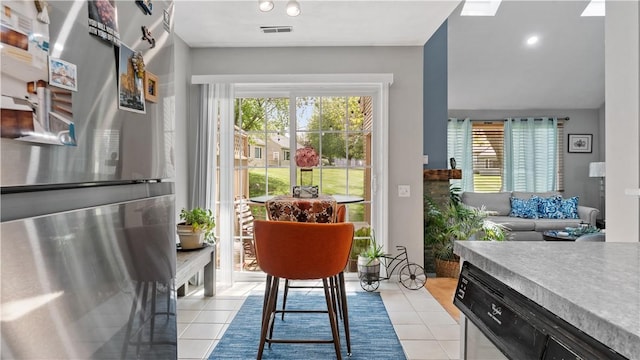 75 Valley Green Ct Unit C, North Providence, RI 02911 - dining area with plenty of natural light and light tile patterned floors
