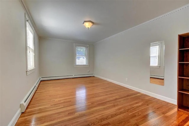 368 Thayer St Unit 2, Providence, RI 02906 - unfurnished room featuring a baseboard radiator, light wood finished floors, and ornamental molding