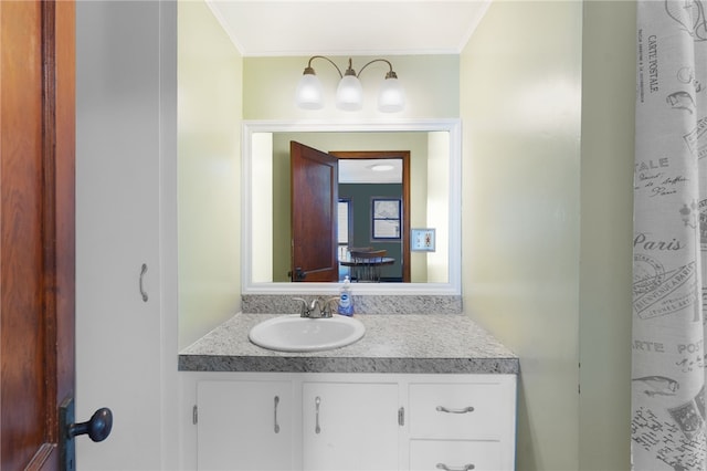 34 Bates Ave, Coventry, RI 02816 - bathroom with vanity and ornamental molding