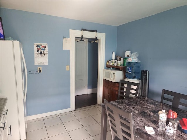 95 Congress Ave, Providence, RI 02907 - dining area featuring light tile patterned floors and baseboards