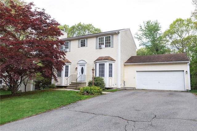 21 Fieldstone Dr, Coventry, RI 02816 - colonial inspired home with driveway, a garage, and a front yard