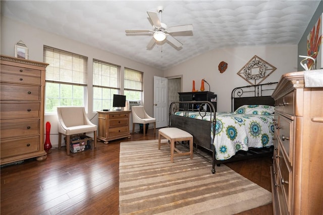 21 Fieldstone Dr, Coventry, RI 02816 - bedroom with dark wood-style flooring, vaulted ceiling, and a ceiling fan