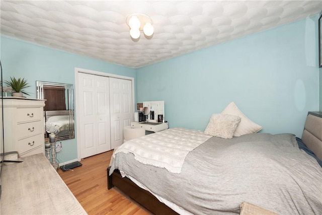 21 Fieldstone Dr, Coventry, RI 02816 - bedroom with a closet and wood finished floors