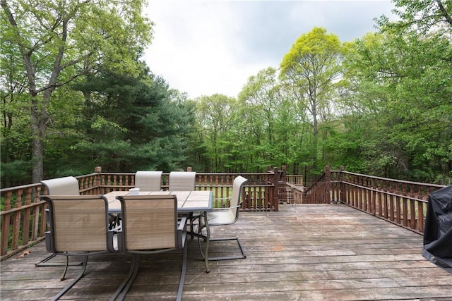 21 Fieldstone Dr, Coventry, RI 02816 - wooden deck featuring outdoor dining space