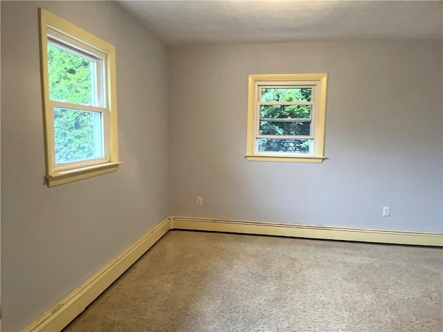 10 Cavalier Rd, Narragansett, RI 02882 - spare room with a baseboard heating unit and baseboards
