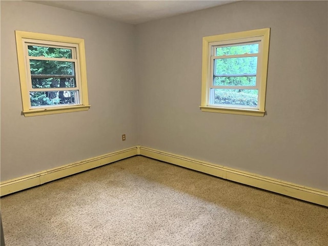 10 Cavalier Rd, Narragansett, RI 02882 - unfurnished room with speckled floor and a baseboard heating unit