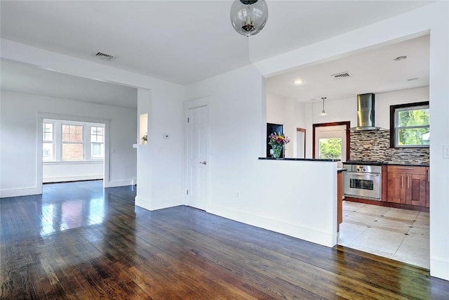 77 Glen Ave, Cranston, RI 02905 - unfurnished living room featuring wood finished floors and baseboards
