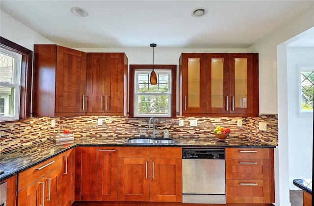 77 Glen Ave, Cranston, RI 02905 - kitchen featuring stainless steel dishwasher, a sink, dark stone countertops, and glass insert cabinets