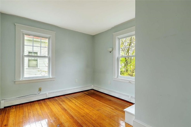 77 Glen Ave, Cranston, RI 02905 - unfurnished room with hardwood / wood-style floors, baseboards, and baseboard heating