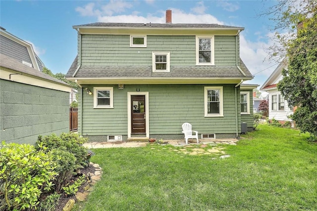 77 Glen Ave, Cranston, RI 02905 - back of house with a yard, roof with shingles, a chimney, and central AC
