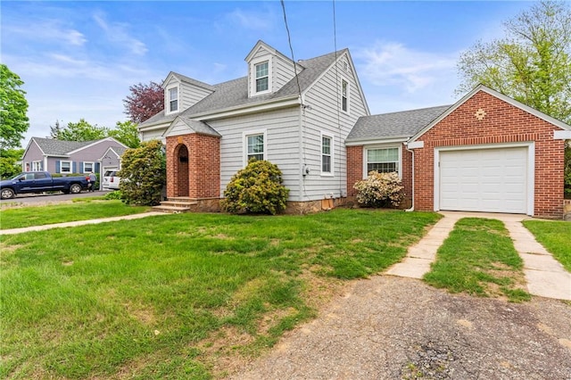 12 Arlington St, Westerly, RI 02891 - view of front of home with dirt driveway, a garage, a front lawn, and brick siding