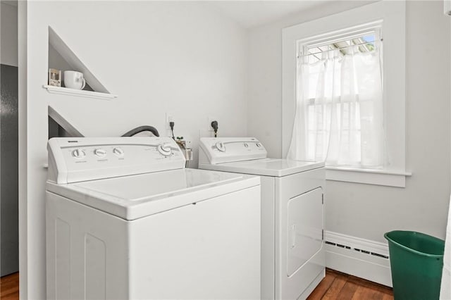 12 Arlington St, Westerly, RI 02891 - laundry area with a baseboard radiator, washer and clothes dryer, and dark wood finished floors