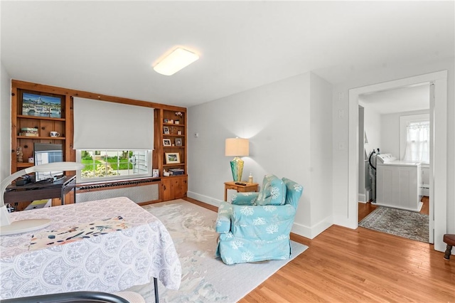 12 Arlington St, Westerly, RI 02891 - bedroom with radiator heating unit, wood finished floors, multiple windows, and baseboards