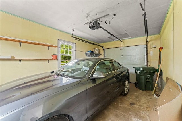 12 Arlington St, Westerly, RI 02891 - garage featuring a garage door opener