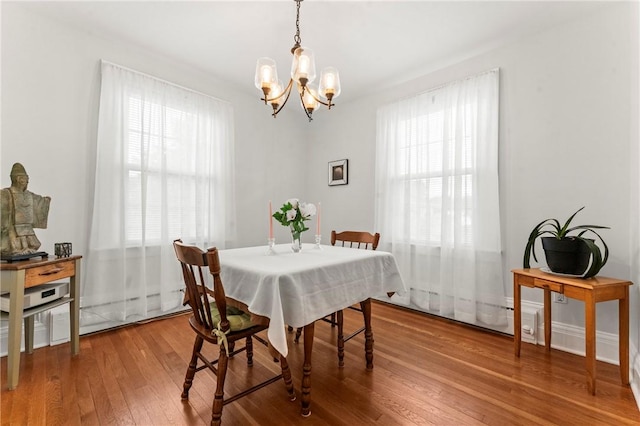 12 Arlington St, Westerly, RI 02891 - dining space featuring a chandelier and hardwood / wood-style flooring