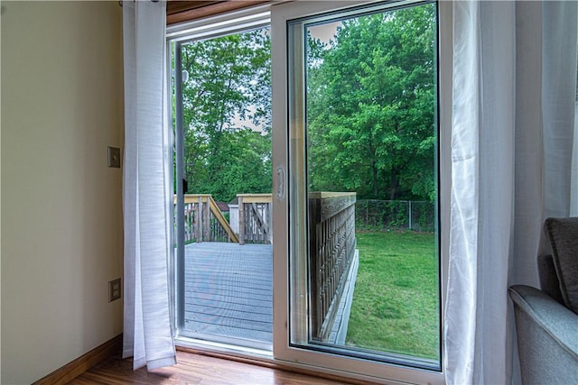 417 Privilege St, Woonsocket, RI 02895 - doorway to outside featuring baseboards