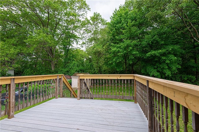 417 Privilege St, Woonsocket, RI 02895 - deck featuring view of wooded area