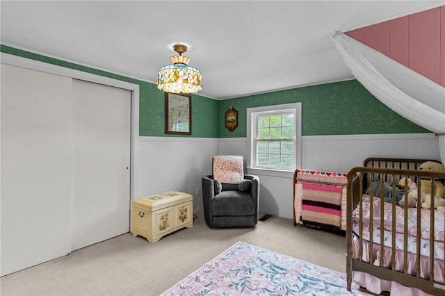 223 Chopmist Hill Rd, Glocester, RI 02814 - carpeted bedroom featuring a wainscoted wall and a nursery area