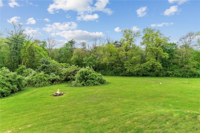 223 Chopmist Hill Rd, Glocester, RI 02814 - view of green lawn featuring a fire pit