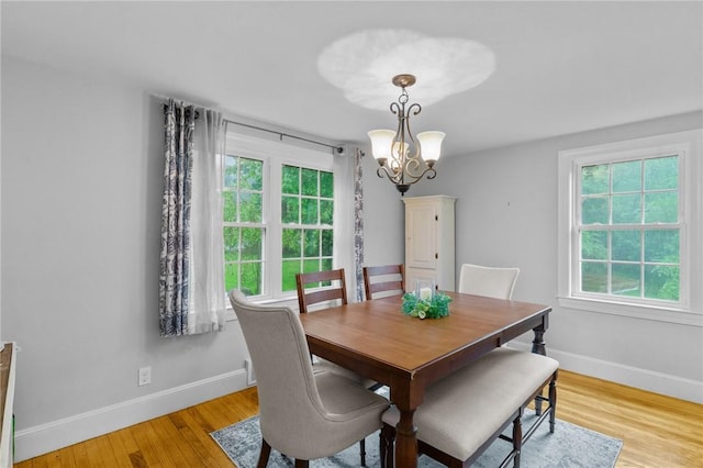 223 Chopmist Hill Rd, Glocester, RI 02814 - dining area featuring healthy amount of natural light, baseboards, and light wood finished floors