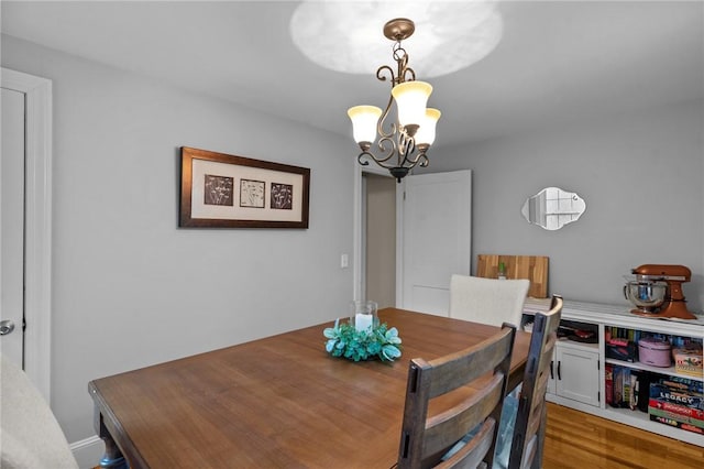 223 Chopmist Hill Rd, Glocester, RI 02814 - dining room with a chandelier and wood finished floors
